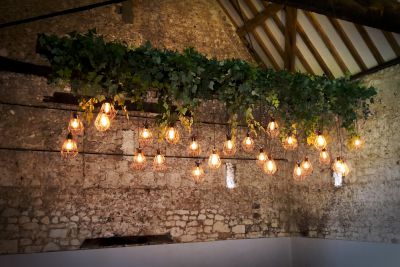 Top Table Feature with Edison Bulbs and  Greenery